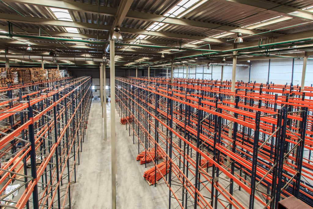 rows of empty warehouse equipment