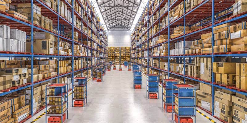 Large modern warehouse with forklifts