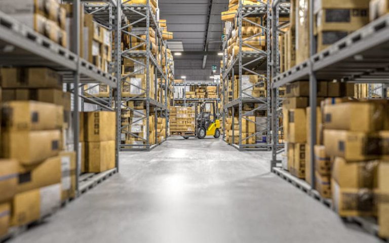 Warehouse filled with stacked boxes