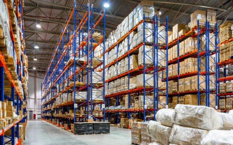 Large warehouse with stacked shelves