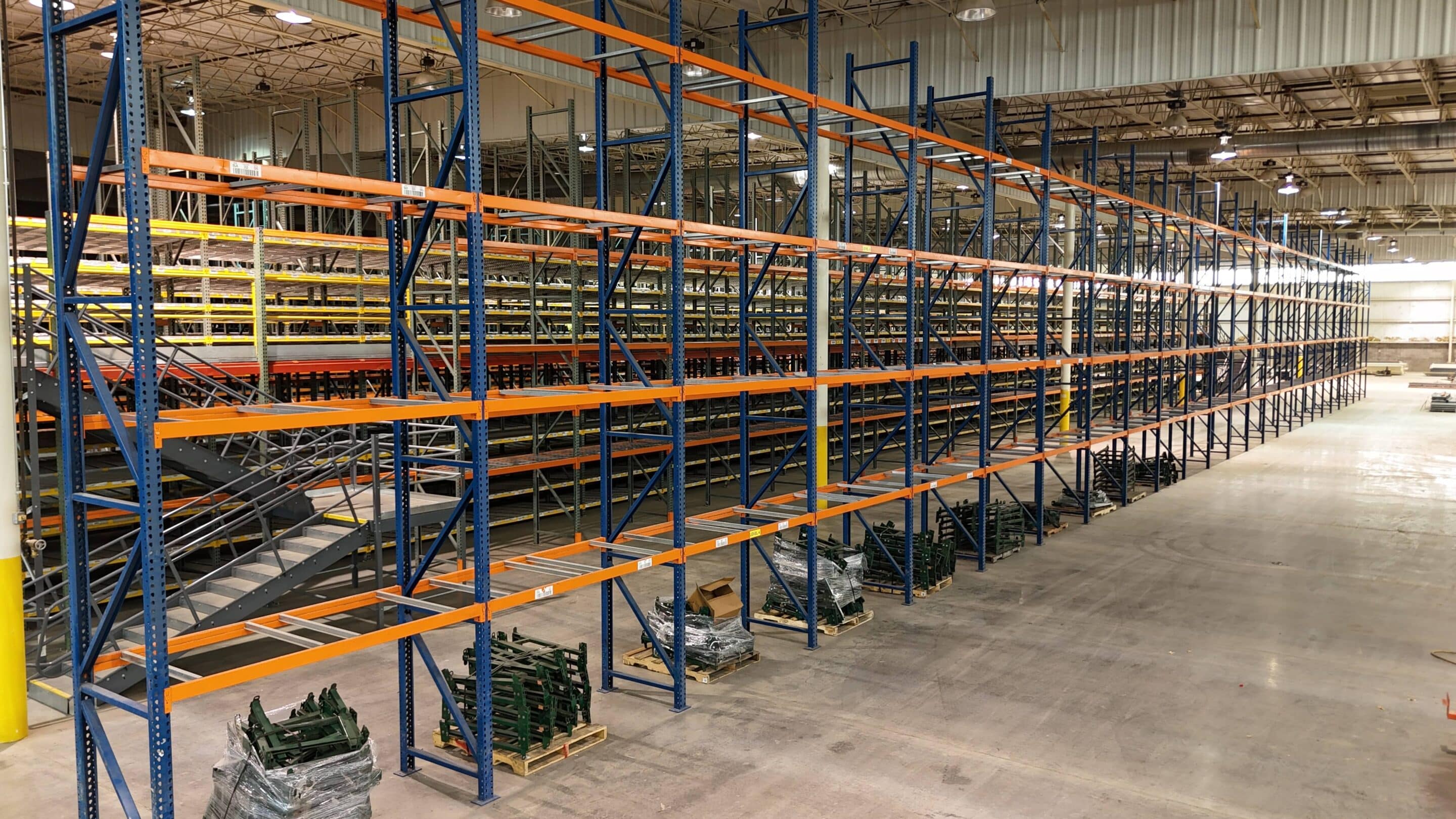 Large modern warehouse with forklifts