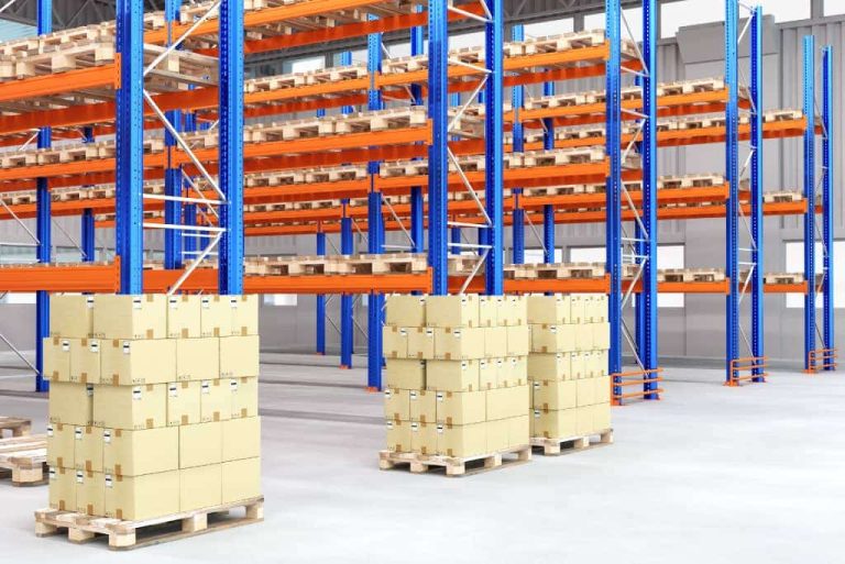 Warehouse with stacked boxes and racks