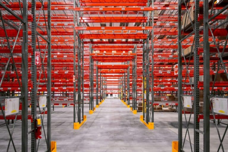 Brightly lit warehouse with pallet racking